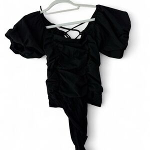 black bodysuit cap sleeves and open back with tie. size medium.